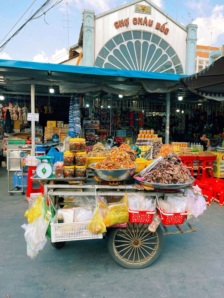 Outdoor market cart filled with fruit and produce